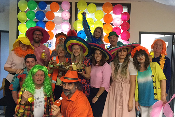 Photo of group of MediaWorks staff dressed up for Pride event