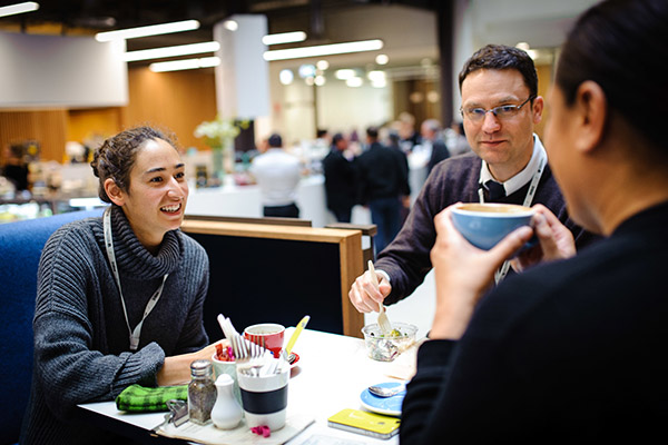 Photo of three public sector employees having coffee