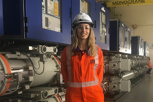 Photo of woman working inside Vector plant