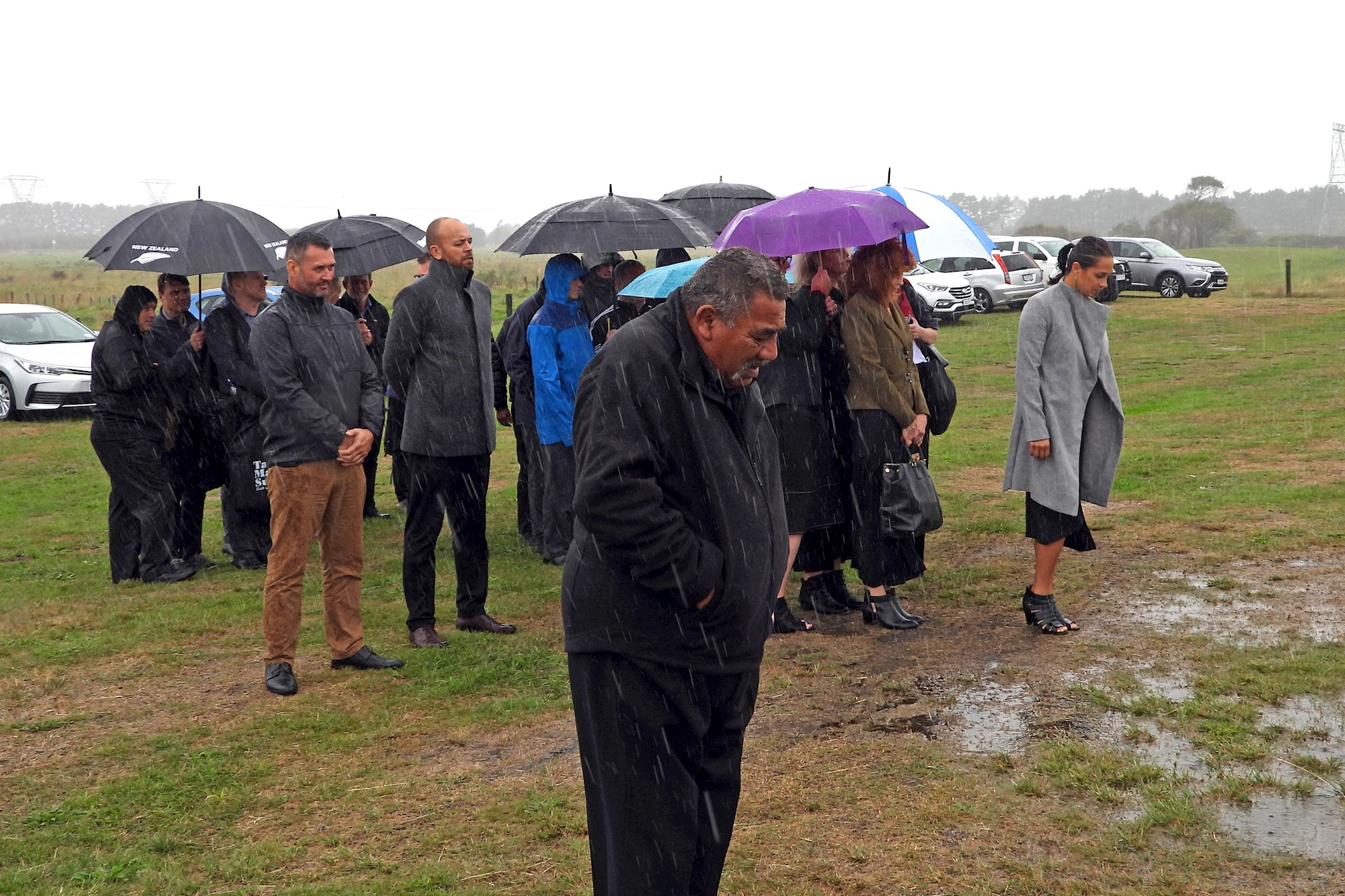 Photo of Downer staff walking onto marae