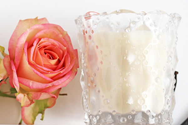 photo of candle and rose