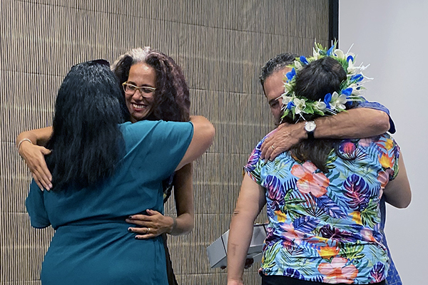 photo of pacifika staff hugging