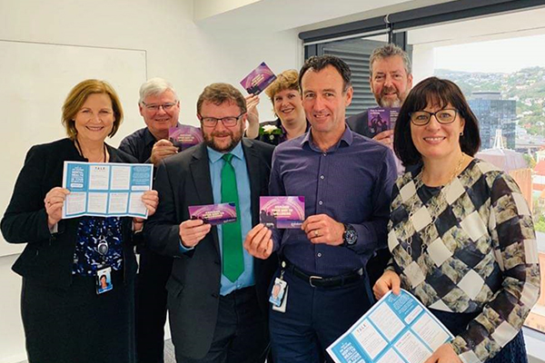 photo of staff holding messages