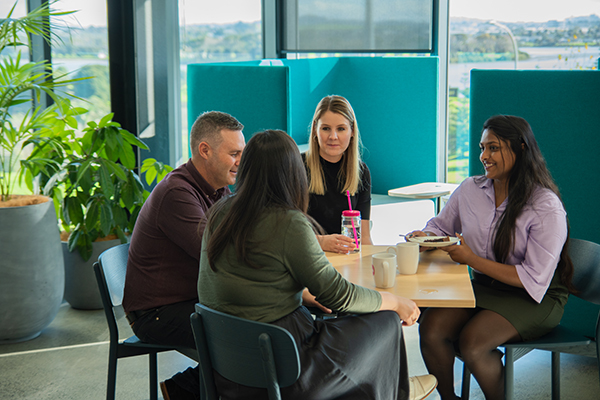 Colleagues enjoying coffee together