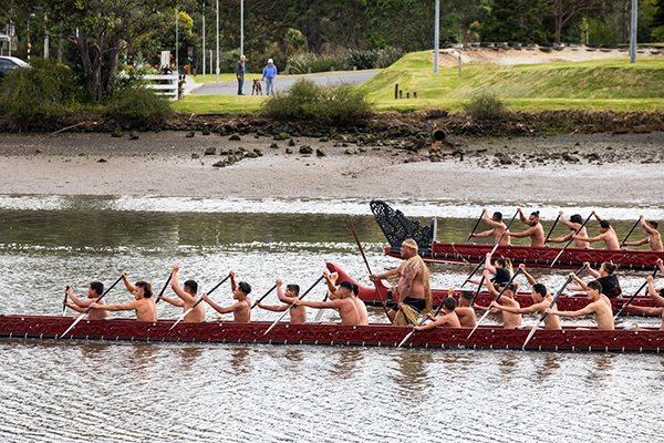 Waka racing on river