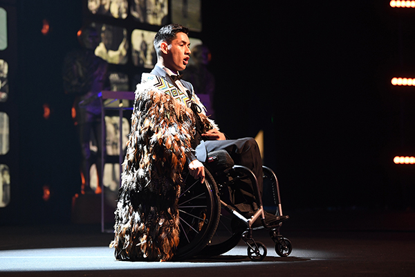 Man in wheelchair on stage