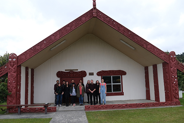 Springload group in front of Marae