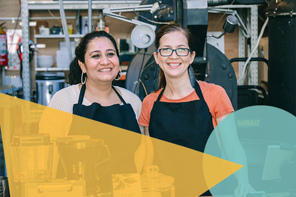 Two women working at a cafe