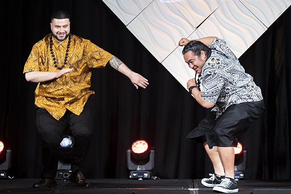 Pasifika men dancing on stage in celebration at the Diversity Awards NZ
