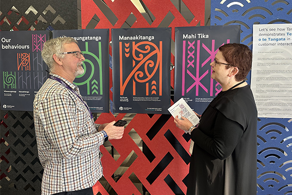 Staff in front of Te Pou o te Tangata strategy