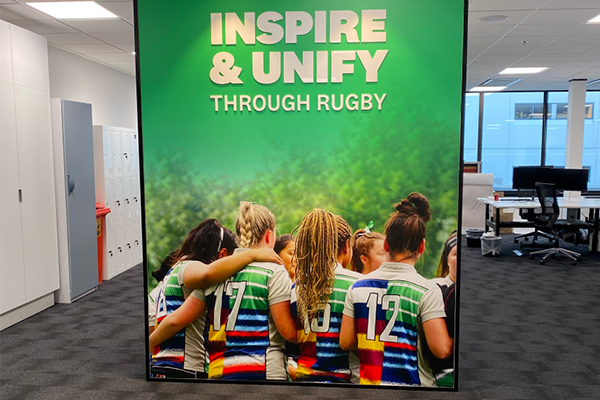 Womens rugby poster in office space