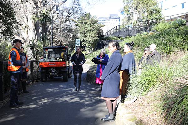 Staff being shown around outdoors