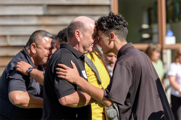 Staff and students hongi