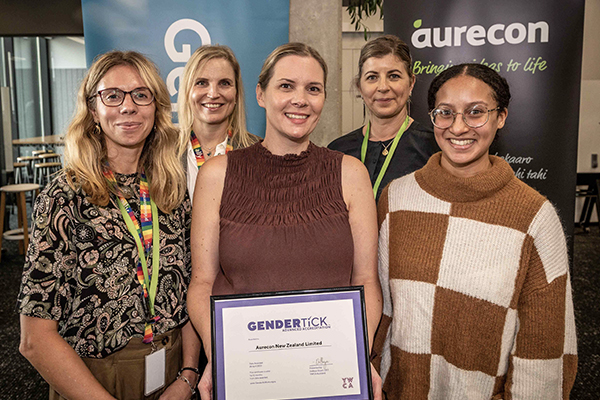 Claire Stuart from Gender Tick presents three Aurecon team members with the Gender Tick certficate