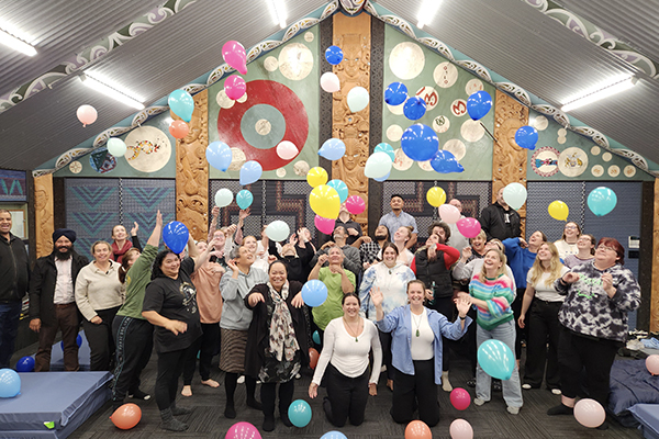 Staff with flying balloons