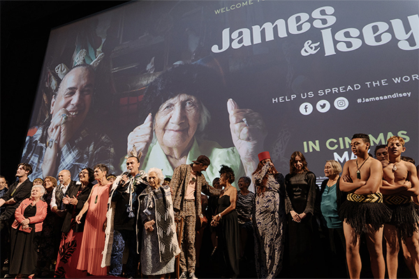 Crew on stage at film premiere