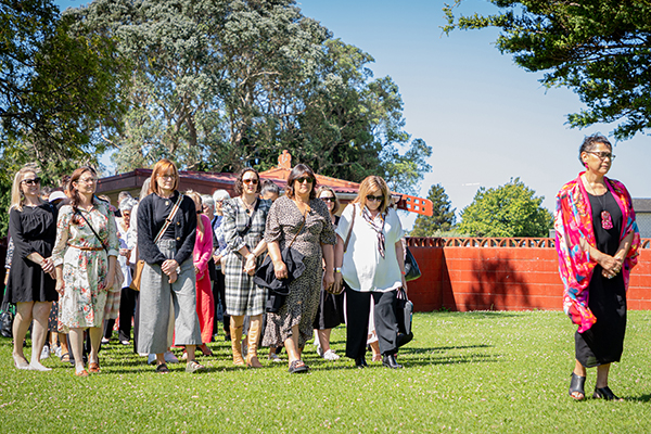 Group walking onto a Marae